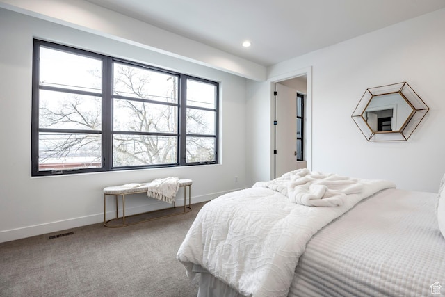 656 N E Capitol St, Salt Lake City, UT 84103 - carpeted bedroom with baseboards and recessed lighting