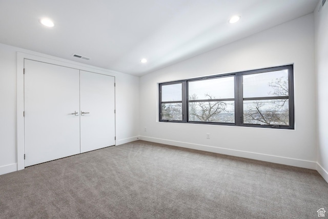 656 N E Capitol St, Salt Lake City, UT 84103 - unfurnished bedroom with lofted ceiling, carpet floors, recessed lighting, and a closet