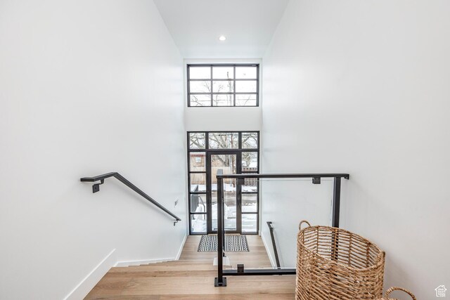 656 N E Capitol St, Salt Lake City, UT 84103 - stairway featuring wood finished floors and baseboards