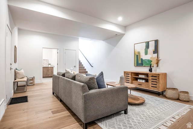 656 N E Capitol St, Salt Lake City, UT 84103 - living area featuring stairway, light wood finished floors, and recessed lighting