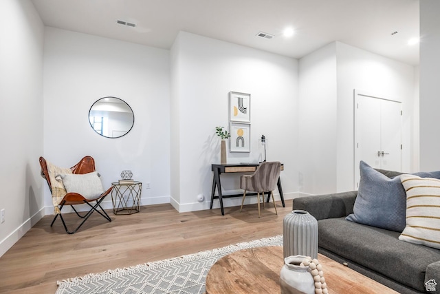656 N E Capitol St, Salt Lake City, UT 84103 - living room with light wood-type flooring and recessed lighting