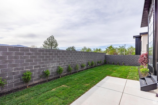 656 N E Capitol St, Salt Lake City, UT 84103 - fenced backyard featuring a patio area