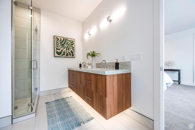 656 N E Capitol St, Salt Lake City, UT 84103 - bathroom with a shower stall, double vanity, and tile patterned floors