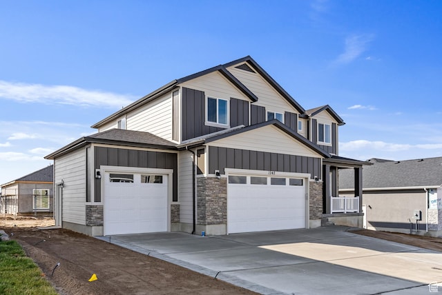 1749 S Sageberry Dr Unit 350, Santaquin, UT 84655 - craftsman inspired home featuring board and batten siding, concrete driveway, stone siding, and a garage