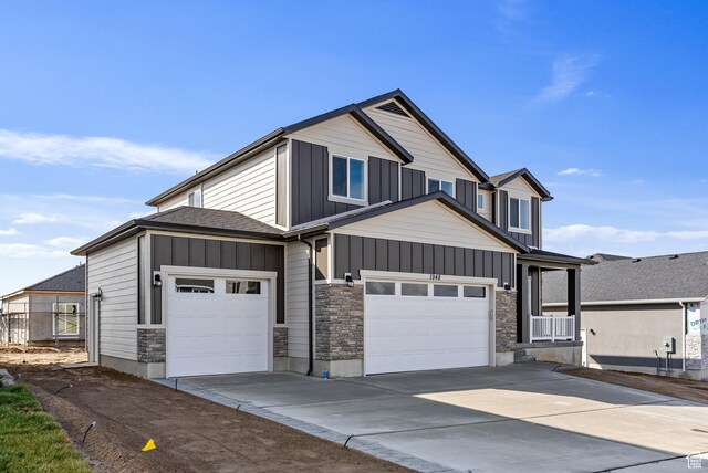 1749 S Sageberry Dr Unit 350, Santaquin, UT 84655 - craftsman inspired home featuring board and batten siding, concrete driveway, stone siding, and a garage