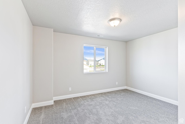 1749 S Sageberry Dr Unit 350, Santaquin, UT 84655 - spare room featuring carpet floors, a textured ceiling, and baseboards