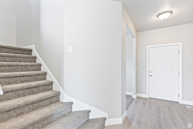 1749 S Sageberry Dr Unit 350, Santaquin, UT 84655 - stairway featuring baseboards and wood finished floors