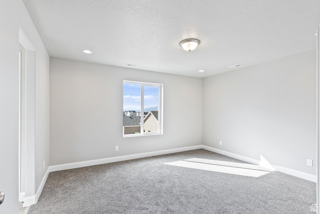 1749 S Sageberry Dr Unit 350, Santaquin, UT 84655 - empty room featuring carpet, baseboards, recessed lighting, and a textured ceiling