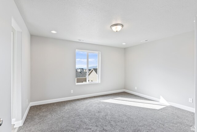 1749 S Sageberry Dr Unit 350, Santaquin, UT 84655 - empty room featuring carpet, baseboards, recessed lighting, and a textured ceiling