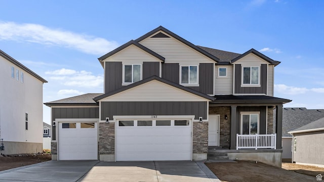 1749 S Sageberry Dr Unit 350, Santaquin, UT 84655 - craftsman-style home featuring stone siding, covered porch, driveway, and a garage