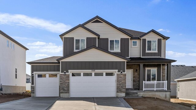 1749 S Sageberry Dr Unit 350, Santaquin, UT 84655 - craftsman-style home featuring stone siding, covered porch, driveway, and a garage