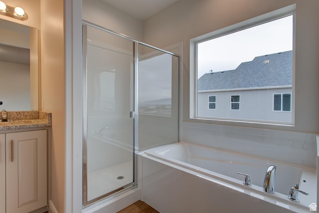 1641 S Windsong Dr Unit 371, Santaquin, UT 84655 - bathroom featuring a stall shower, vanity, and a bath