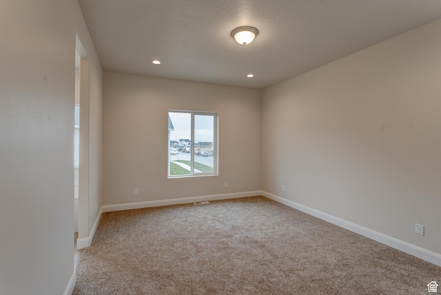 1641 S Windsong Dr Unit 371, Santaquin, UT 84655 - carpeted empty room featuring baseboards and recessed lighting