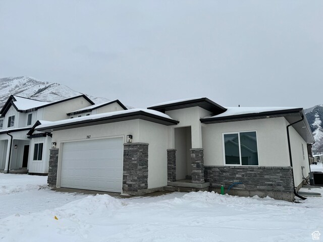 1701 S Windsong Dr Unit 377, Santaquin, UT 84655 - view of front of home with a garage and central air condition unit