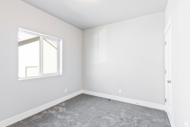 1781 S Windsong Dr Unit 384, Santaquin, UT 84655 - empty room featuring carpet floors and baseboards