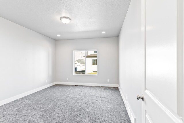 1781 S Windsong Dr Unit 384, Santaquin, UT 84655 - carpeted empty room with a textured ceiling, recessed lighting, and baseboards