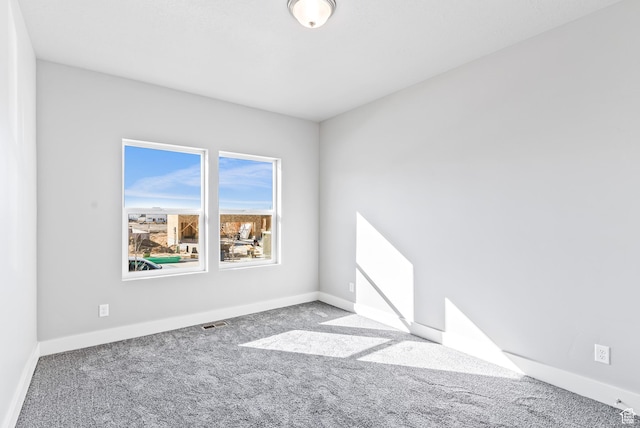 1781 S Windsong Dr Unit 384, Santaquin, UT 84655 - carpeted spare room featuring baseboards