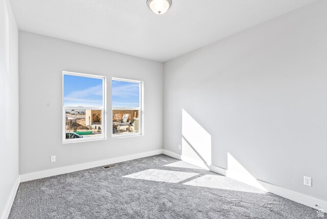 1781 S Windsong Dr Unit 384, Santaquin, UT 84655 - carpeted spare room featuring baseboards