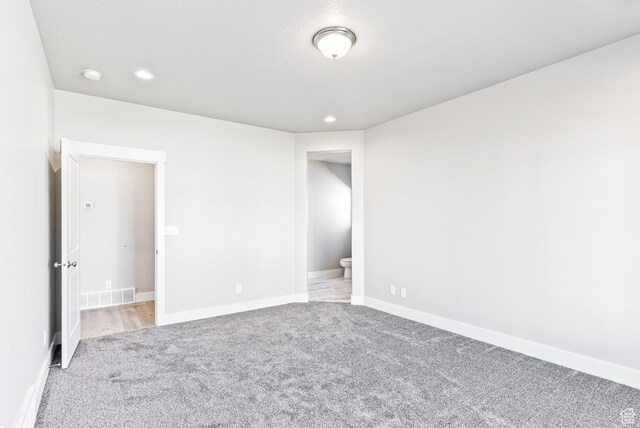 1781 S Windsong Dr Unit 384, Santaquin, UT 84655 - unfurnished bedroom featuring light colored carpet, recessed lighting, and baseboards