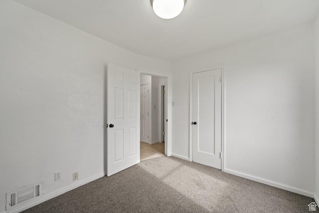 37 N Lakeview Dr, Clearfield, UT 84015 - unfurnished bedroom featuring light colored carpet, visible vents, and baseboards