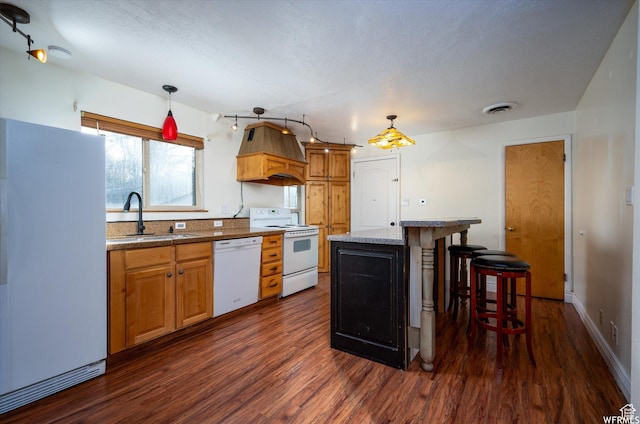 4180 Liberty Ave, South Ogden, UT 84403 - kitchen with white appliances, visible vents, custom exhaust hood, a sink, and dark wood-style floors
