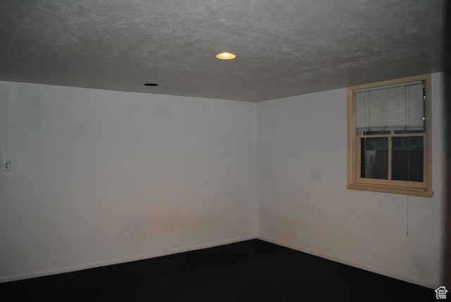619 E 400 N, Logan, UT 84321 - empty room with recessed lighting, baseboards, and a textured ceiling