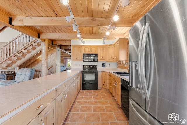 4245 S Artifact Dr, Cedar City, UT 84720 - kitchen with light brown cabinetry, black appliances, sink, hanging light fixtures, and beamed ceiling