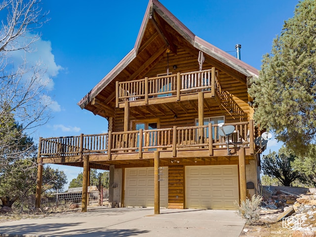 cabin featuring a garage