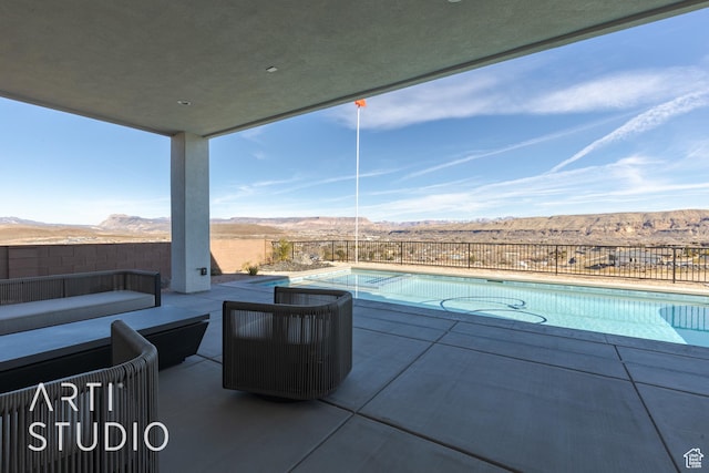 627 S 1800 W, Hurricane, UT 84737 - view of pool featuring an outdoor hangout area, a patio, and a mountain view