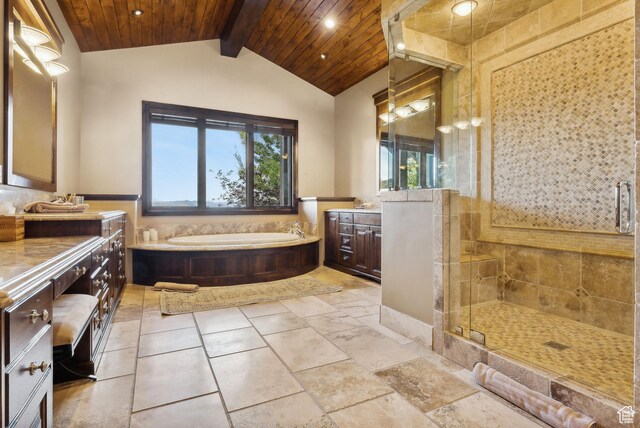 3608 Sun Ridge Dr, Park City, UT 84060 - bathroom with lofted ceiling with beams, a stall shower, a bath, and vanity