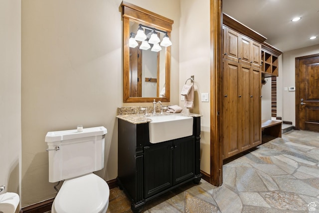 3608 Sun Ridge Dr, Park City, UT 84060 - full bath with a bathing tub, stone finish flooring, toilet, recessed lighting, and vanity
