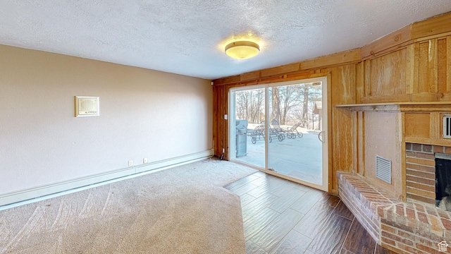 410 S Woodland Hills Dr, Woodland Hills, UT 84653 - interior space with a fireplace and a textured ceiling