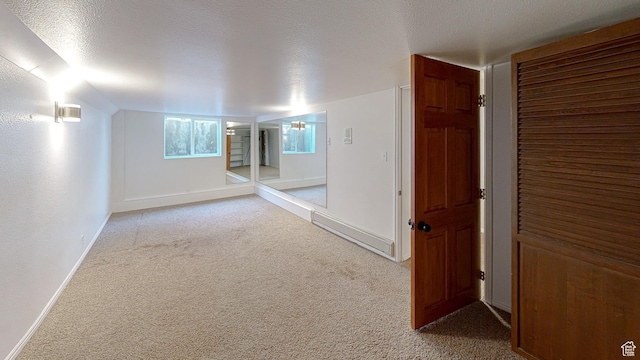 410 S Woodland Hills Dr, Woodland Hills, UT 84653 - carpeted empty room featuring baseboards and a textured ceiling