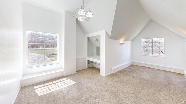 410 S Woodland Hills Dr, Woodland Hills, UT 84653 - bonus room featuring a notable chandelier, carpet, baseboards, and vaulted ceiling