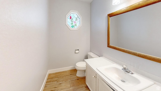 410 S Woodland Hills Dr, Woodland Hills, UT 84653 - half bath with toilet, vanity, baseboards, and wood finished floors