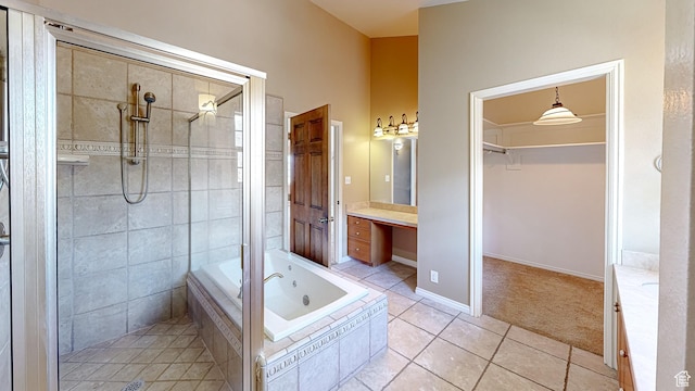 410 S Woodland Hills Dr, Woodland Hills, UT 84653 - full bath with a garden tub, tiled shower, tile patterned floors, and vanity