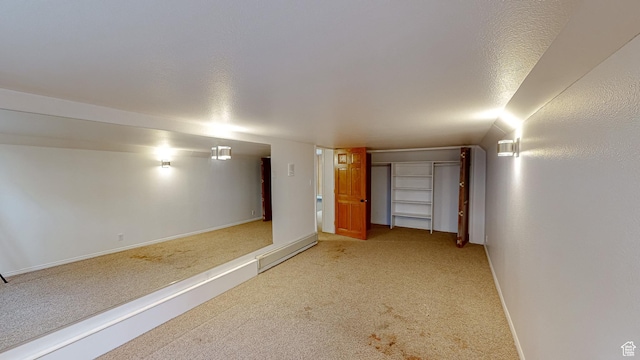 410 S Woodland Hills Dr, Woodland Hills, UT 84653 - finished basement featuring baseboards, light colored carpet, and baseboard heating