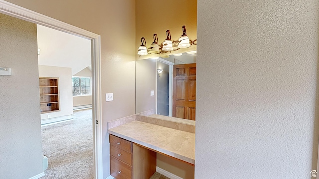 410 S Woodland Hills Dr, Woodland Hills, UT 84653 - bathroom with a baseboard radiator, vanity, and a textured wall