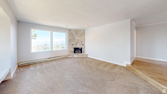 410 S Woodland Hills Dr, Woodland Hills, UT 84653 - unfurnished living room with a fireplace, a textured ceiling, baseboard heating, baseboards, and carpet