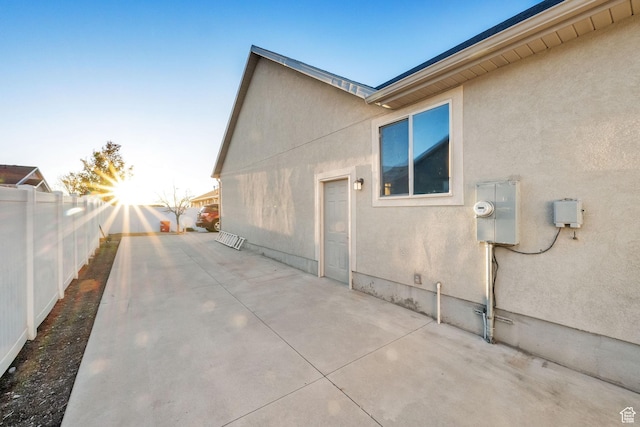 1052 S 350 E, Payson, UT 84651 - view of side of property featuring a fenced backyard, stucco siding, and a patio