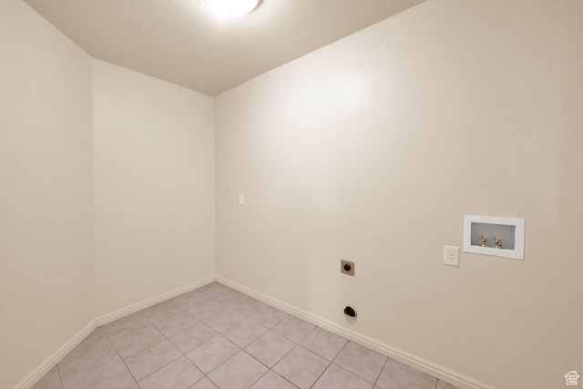 1052 S 350 E, Payson, UT 84651 - laundry room featuring electric dryer hookup, hookup for a washing machine, light tile patterned floors, and baseboards