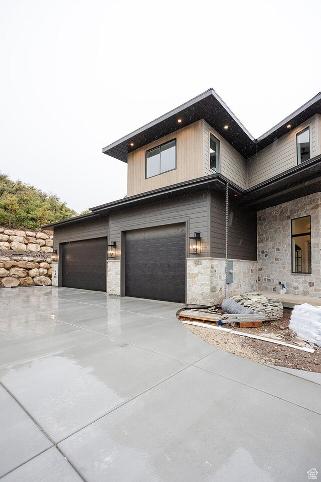 672 Skyview Cir N, Salt Lake, UT 84054 - view of property exterior with a garage