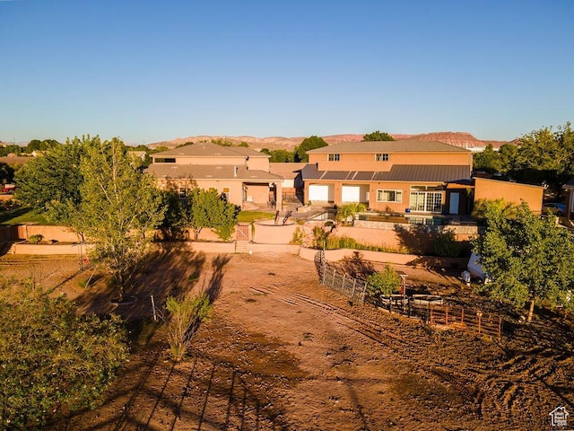 back of house featuring stucco siding