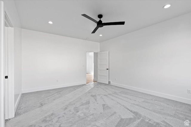 unfurnished bedroom with baseboards and recessed lighting