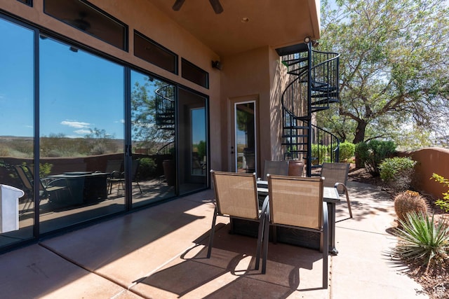 4985 W Boulder Vw, Hurricane, UT 84737 - view of patio / terrace with stairs, outdoor dining space, and a ceiling fan