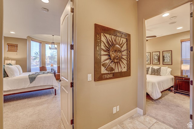 4985 W Boulder Vw, Hurricane, UT 84737 - bedroom with baseboards, recessed lighting, light tile patterned floors, and light carpet