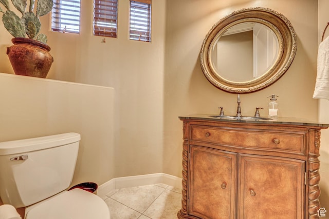 4985 W Boulder Vw, Hurricane, UT 84737 - bathroom with baseboards, toilet, tile patterned flooring, and vanity