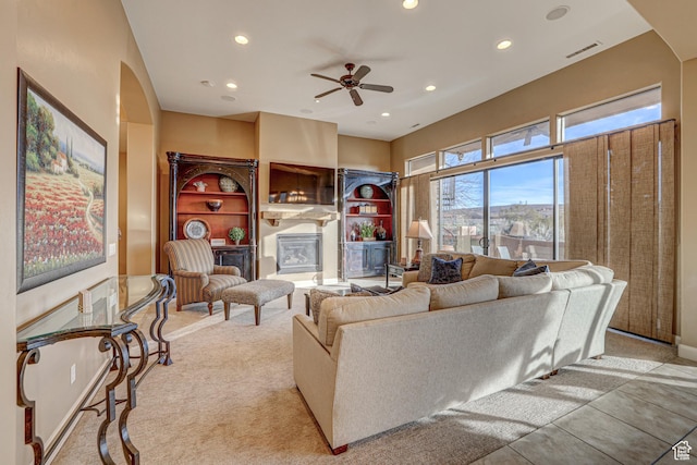4985 W Boulder Vw, Hurricane, UT 84737 - living room featuring visible vents, ceiling fan, a glass covered fireplace, and recessed lighting