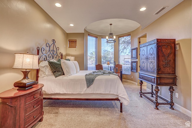 4985 W Boulder Vw, Hurricane, UT 84737 - bedroom with light carpet, baseboards, visible vents, and an inviting chandelier