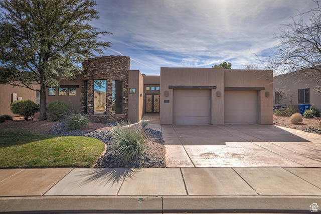 4985 W Boulder Vw, Hurricane, UT 84737 - southwest-style home with stucco siding, an attached garage, and concrete driveway
